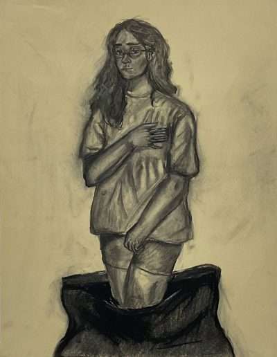Charcoal drawing of a person with long hair and glasses, standing in a black bag.